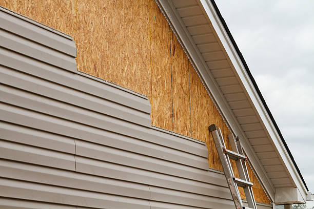Professional Vinyl Siding technician working in Liverpool, PA